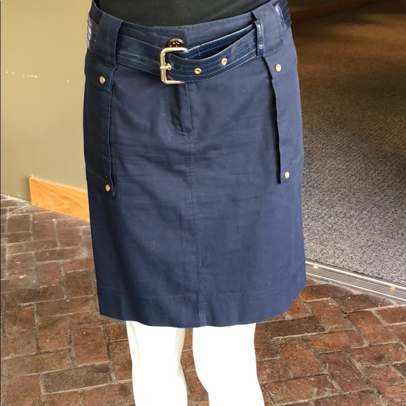 navy skirt with gold buttons